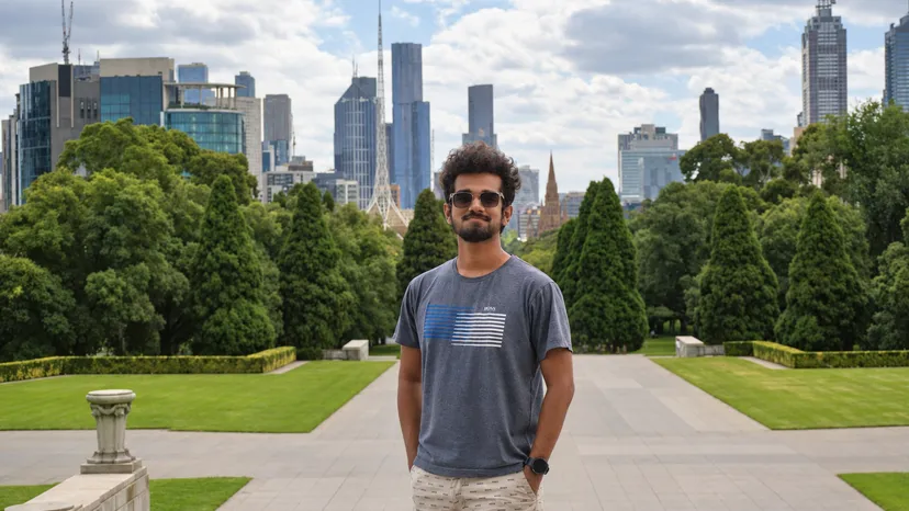 Pankaja Balasooriya standing on the forecourt of the Shrine of Remembrance, with the Melbourne skyline behind.